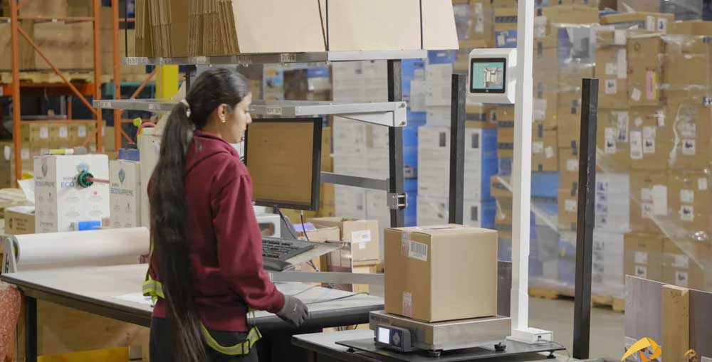 Screenshot-2025-04-24-at-1.13.08-PM-1 woman in warehouse