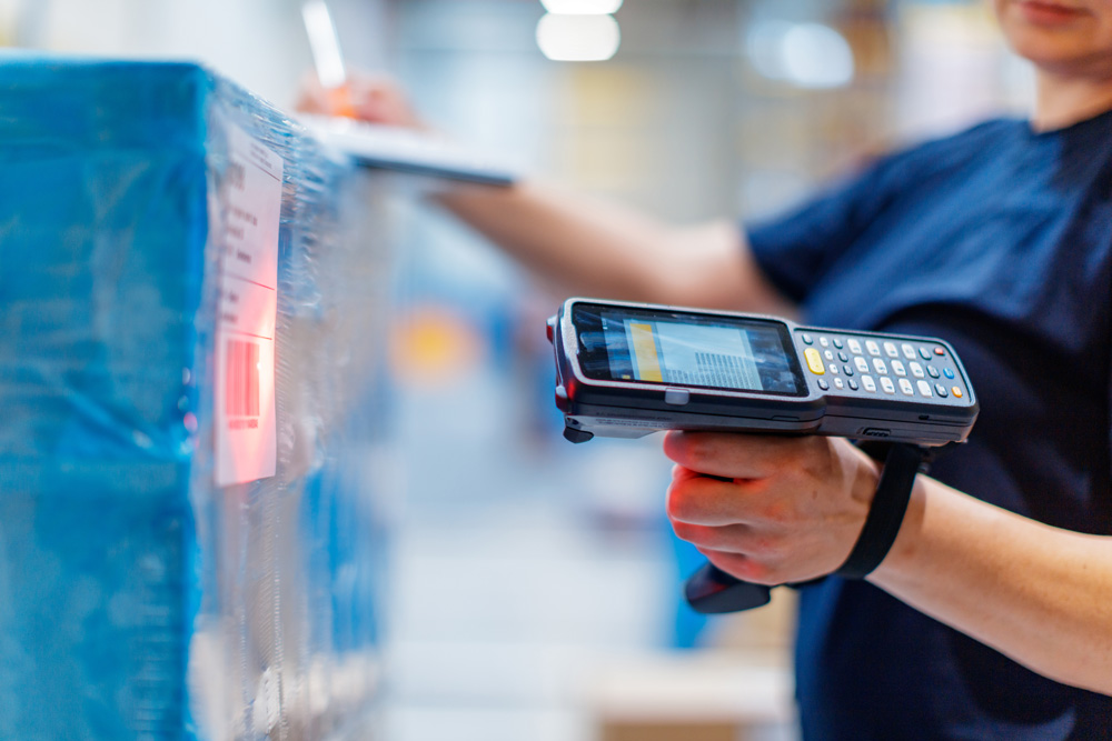 man scanning a package
