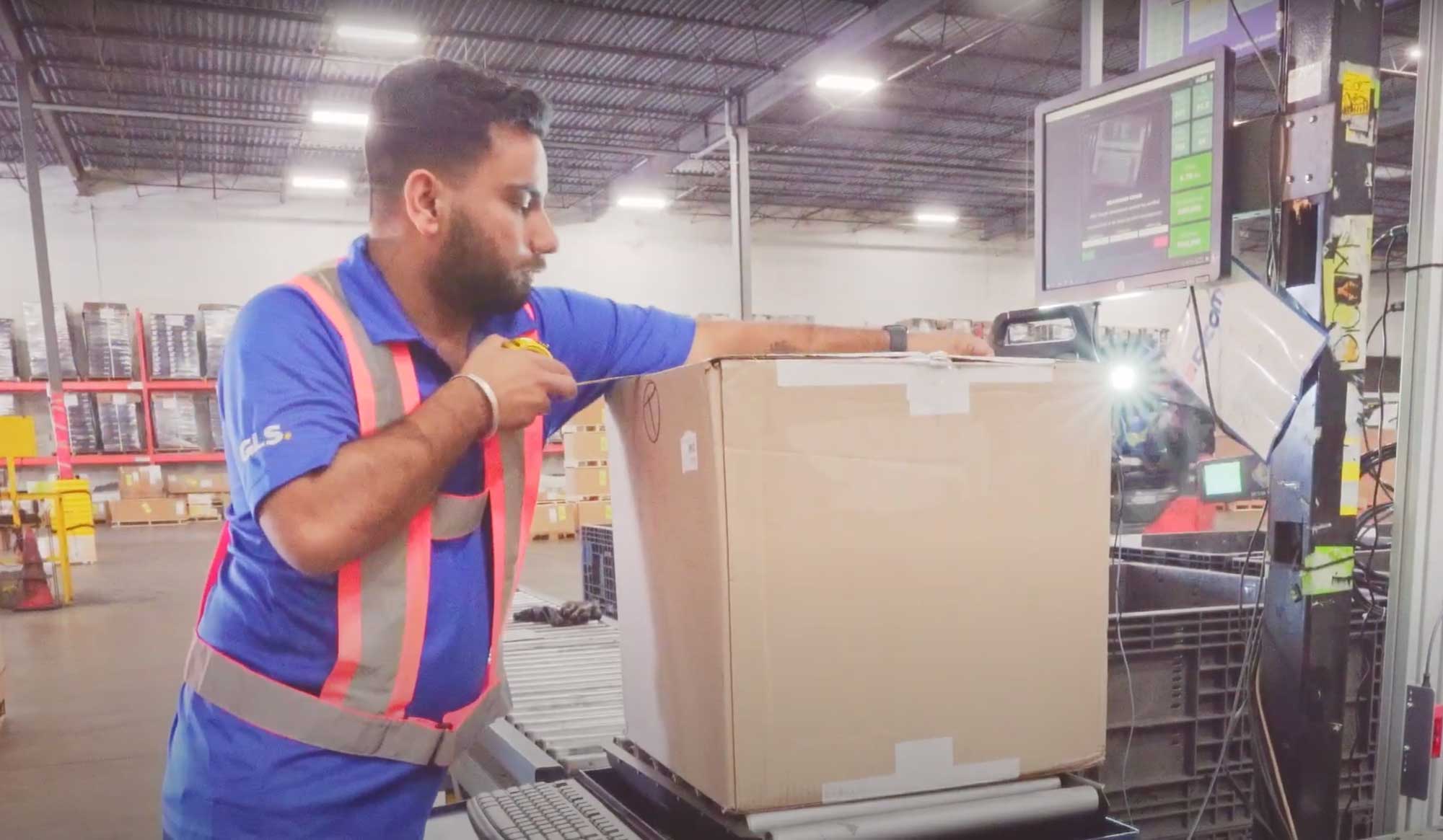 man weighing a package